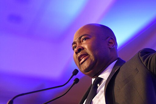 In this Monday, Feb. 24, 2020 photo, Democratic Senate candidate Jaime Harrison, who is challenging U.S. Sen. Lindsey Graham, R-S.C., speaks at a South Carolina Democratic Party dinner in Charleston, S.C. (AP Photo/Meg Kinnard)