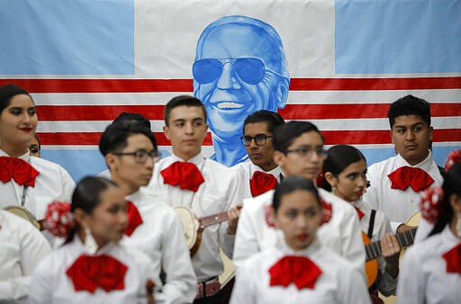 FILE - In this Jan. 11, 2020, file photo, a Mariachi band waits to perform before a campaign event with former Vice President and Democratic presidential candidate Joe Biden in Las Vegas. In Joe Biden&#146;s pursuit of the Democratic presidential nomination, he&#146;s run repeatedly into a wall in the West, where Bernie Sanders&#146; strength among Latinos propelled his campaign even as he struggled with other groups. Tuesday&#146;s primaries in Arizona and Florida offer Biden a chance to show he can make up ground with Latinos, a crucial group of voters he&#146;ll need in his corner to defeat Trump (AP Photo/John Locher, File)