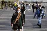 Virus toll in Iran climbs as lockdowns deepen across Mideast