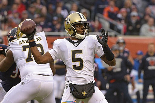 FILE - In this Sunday, Oct. 20, 2019 file photo, New Orleans Saints quarterback Teddy Bridgewater (5) throws against the Chicago Bears during the first half of an NFL football game in Chicago. Now that we know Philip Rivers won't be leading the Chargers into SoFi Stadium in September, the muddied waters of NFL quarterbacking have been cleared a bit. Assuming Drew Brees re-signs with New Orleans  he's pretty much said he will  and Teddy Bridgewater hits the open market, the only unknown in this sector is in Carolina.(AP Photo/Mark Black, File)