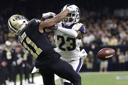 FILE - In this Jan. 20, 2019, file photo, Los Angeles Rams' Nickell Robey-Coleman breaks up a pass intended for New Orleans Saints' Tommylee Lewis during the second half of the NFL football NFC championship game in New Orleans. With &#147;The Catch&#148; that sent San Francisco to its first Super Bowl and &#147;The Blown Call&#148; that kept New Orleans at home, NFC championship games have two seminal moments that rank with just about any in postseason history. (AP Photo/Gerald Herbert, File)