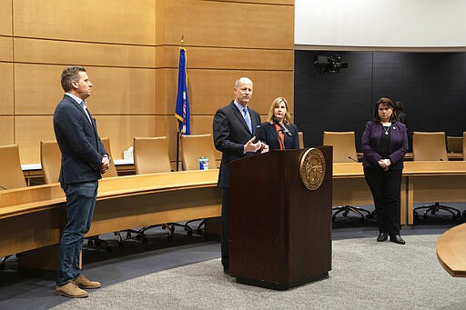 Legislative leaders kept the appropriate social distancing while laying out the plans for operations in response to coronavirus and COVID-19 concerns Monday, March 16, 2020 in St. Paul. From left are House Minority Leader Kurt Daudt, R-Crown, Senate Majority Leader Paul Gazelka, R-Baxter, House Speaker Melissa Hortman, DFL-Brooklyn Park and Senate Minority Leader Susan Kent, DFL-Woodbury.  (Glen Stubbe/Star Tribune via AP)