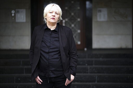 Susanne Bleier Wilp, a former sex worker and spokeswoman for the Association of Erotic and Sexual Services Proviers, or BESD, poses for a photograph after an interview with the Associated Press about the coronavirus outbreak for the business of sexworkers in Berlin, Germany, Wednesday, March 11, 2020. (AP Photo/Markus Schreiber)