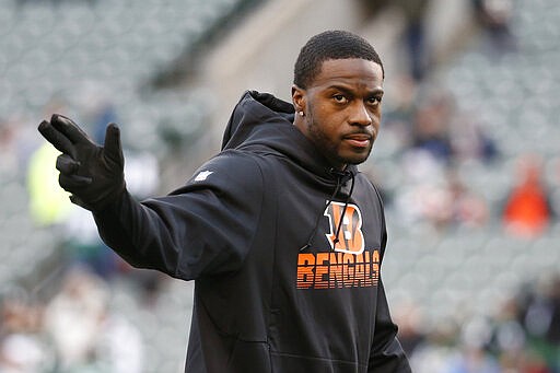 FILE - In this Dec. 1, 2019, file photo, Cincinnati Bengals wide receiver A.J. Green practices before an NFL football game against the New York Jets in Cincinnati. The Bengals used their franchise tag on A.J. Green, giving them time to try to work out a long-term deal with the star who is one of the most accomplished receivers in franchise history and would be a vital part of breaking in a new quarterback.(AP Photo/Frank Victores, File)