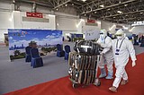 The Latest: Official says Canada, US working on travel curbs