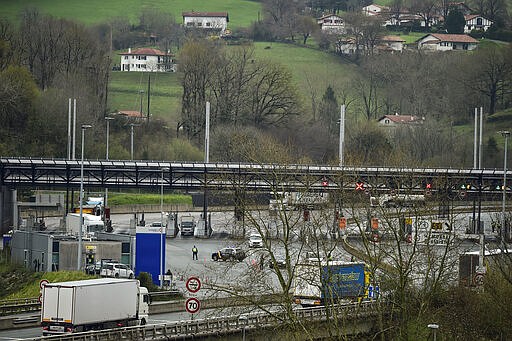 A view of the border between Spain and France near the Spanish basque village of Irun, northern Spain, Tuesday, March 17, 2020. Spain is restoring border controls and severely restricting who can enter the country. Interior Minister Fernando Grande-Marlaska announced Monday that only Spaniards or residents in Spain, people who work just across the border or who have a compelling need will be allowed through. For most people, the new coronavirus causes only mild or moderate symptoms. For some it can cause more severe illness. (AP Photo/Alvaro Barrientos)