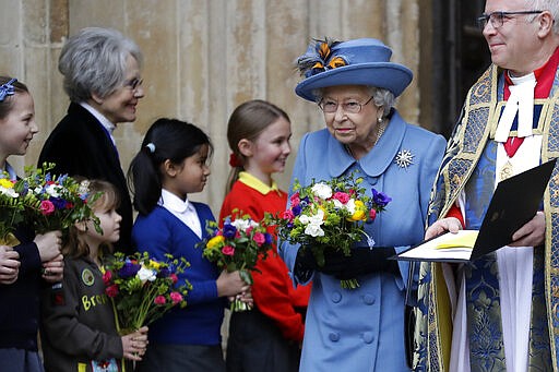 Britain's Queen Elizabeth II leaves after attending the annual Commonwealth Day service at Westminster Abbey in London, Monday, March 9, 2020. The annual service, organised by the Royal Commonwealth Society, is the largest annual inter-faith gathering in the United Kingdom. (AP Photo/Kirsty Wigglesworth)