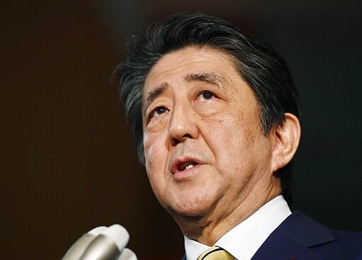 Japan's Prime Minister Shinzo Abe speaks to reporters after the video G-7 summit at the prime minister's office in Tokyo, Tuesday, March 17, 2020.   Prime Minister Abe might be the biggest loser if the Tokyo Olympics don't go off as planned in just over four months. Abe has attached himself to the success of the Olympics since pushing hard for Tokyo's selection at an IOC meeting in 2013 in Buenos Aires, Argentina. Tokyo was picked over Istanbul by billing itself as a &#147;safe pair of hands.&quot;  (Ren Onuma/Kyodo News via AP)