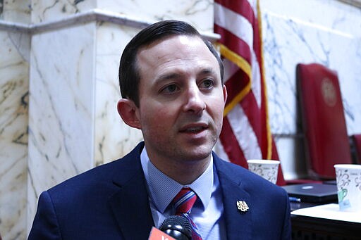 Maryland Senate President Bill Ferguson talks to reporters during a break on Wednesday, March 18, 2020, in Annapolis, Md., on the last day of a shortened legislative session due to the coronavirus. (AP Photo/Brian Witte)