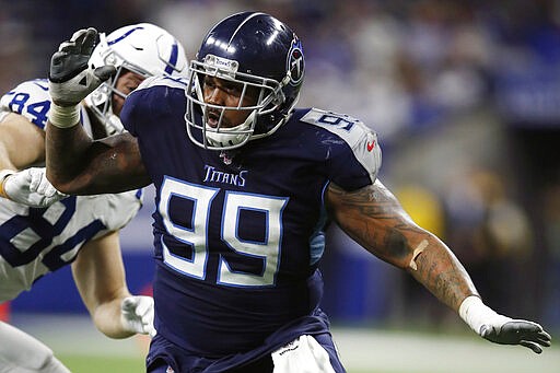 FILE - In this Dec. 1, 2019, file photo, Tennessee Titans defensive end Jurrell Casey (99) rushes in against the Indianapolis Colts during an NFL football game in Indianapolis. The Denver Broncos have acquired five-time Pro Bowl defensive lineman Jurrell Casey from the Tennessee Titans. Two people familiar with the trade tell The Associated Press that the Titans swapped Casey to Denver for a seventh-round draft pick. The move cannot become official until the new league year begins later Wednesday, March 18, 2020, though most teams won&#146;t announce official signings until players pass physicals to finalize deals. (AP Photo/Jeff Haynes, File)