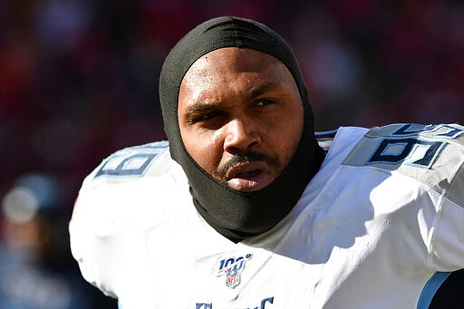 FILE - In this Jan. 19, 2020, file photo, Tennessee Titans defensive end Jurrell Casey is shown before the NFL AFC Championship football game against the Kansas City Chiefs in Kansas City, Mo. The Denver Broncos have acquired five-time Pro Bowl defensive lineman Jurrell Casey from the Tennessee Titans. Two people familiar with the trade tell The Associated Press that the Titans swapped Casey to Denver for a seventh-round draft pick. The move cannot become official until the new league year begins later Wednesday, March 18, 2020, though most teams won&#146;t announce official signings until players pass physicals to finalize deals. (AP Photo/Ed Zurga, File)