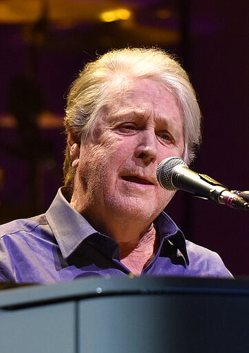 FILE - This Oct. 6, 2017 file photo shows Brian Wilson of The Beach Boys performing at the Rosemont Theatre in Rosemont, Ill.Rolling Stone magazine, which closed its offices like many companies to prevent the coronavirus from spreading, will launch the new IGTV performance series In My Room on Wednesday at 3 p.m. EST. It will feature Wilson performing "In My Room as well as other classic songs; episodes will be released every Monday, Wednesday, and Friday. (Photo by Rob Grabowski/Invision/AP, File)