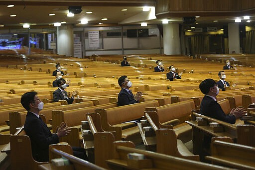 Pastors wearing face masks attend a service at the Yoido Full Gospel Church in Seoul, South Korea, March 15, 2020. (AP Photo/Ahn Young-joon)