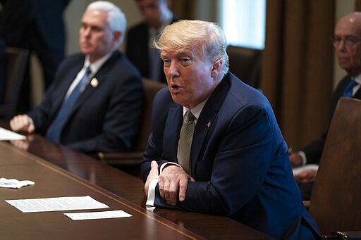 President Donald Trump speaks during a meeting with tourism industry executives about the coronavirus, in the Cabinet Room of the White House, Tuesday, March 17, 2020, in Washington. (AP Photo/Evan Vucci)