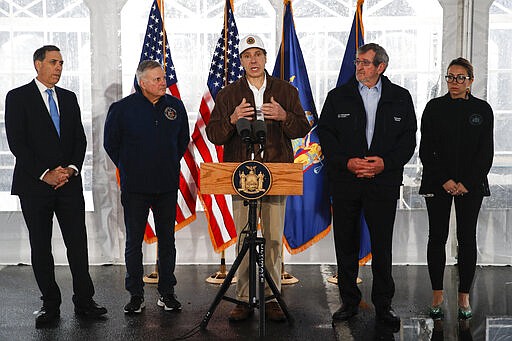 New York Governor Andrew Cuomo speaks during a news conference at a COVID-19 coronavirus infection testing facility at Glen Island Park, Friday, March 13, 2020, in New Rochelle, N.Y.  State officials have set up a &#147;containment area&#148; in the New York City suburb, where schools and houses of worship are closed within a 1-mile radius of a point near a synagogue where an infected person with coronavirus had attended events. State officials stress it is not a lockdown. The vast majority of people recover from the new coronavirus. According to the World  Health Organization, most people recover in about two to six weeks, depending on the severity of the illness. (AP Photo/John Minchillo)