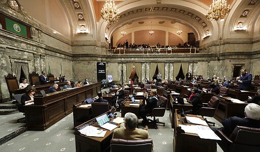 FILE - In this Jan. 30, 2019 file photo, Washington Lt. Gov. Cyrus Habib, second from upper-left, presides over the Senate at the Capitol in Olympia, Wash. Habib announced on Thursday, March 19, 2020, that he is not running for re-election and will join the Jesuit order of the Catholic Church as he starts the process of becoming a priest. (AP Photo/Ted S. Warren, File)