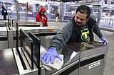 Vital but vulnerable, cleaners hold the line against a virus