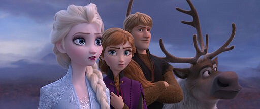 This image released by Disney shows Elsa, voiced by Idina Menzel, from left, Anna, voiced by Kristen Bell, Kristoff, voiced by Jonathan Groff and Sven in a scene from the animated film, &quot;Frozen 2.&quot; The Walt Disney Co. put the box-office hit on its Disney Plus streaming service three months earlier than planned, &#147;surprising families with some fun and joy during this challenging period.&#148; (Disney via AP)