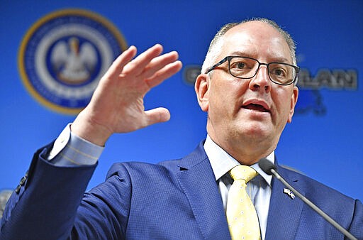 Louisiana Gov. John Bel Edwards speaks at a press conference regarding updates to coronavirus in the state, Wednesday, March 18, 2020, in Baton Rouge, La. (Hilary Scheinuk/The Advocate via AP)