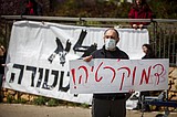 Israelis accuse Netanyahu of exploiting virus to keep power