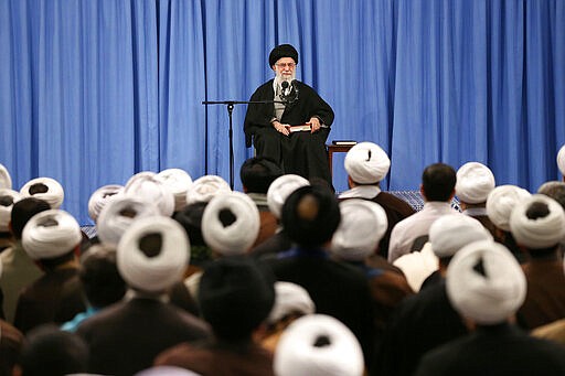 In this photo released by an official website of the office of the Iranian supreme leader, Supreme Leader Ayatollah Ali Khamenei speaks in a meeting in Tehran, Iran, Sunday, Feb. 23, 2020. Officials in Iran haven't announced the full results from parliamentary elections two days ago, but on Sunday the country's supreme leader accused enemy &quot;propaganda&quot; of trying to disuade people from voting by amplifying the threat of the coronavirus. (Office of the Iranian Supreme Leader via AP)