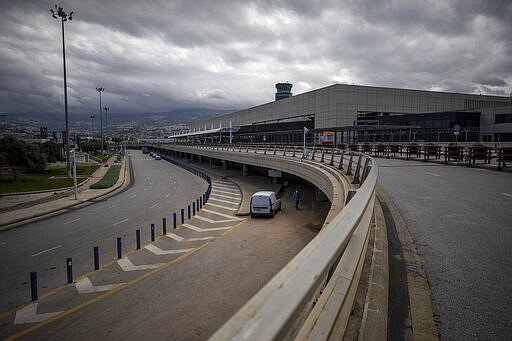 The Rafik Hariri International Airport is empty of passengers as planes are grounded, in Beirut, Lebanon, Thursday, March 19, 2020. The Lebanese government decided to shut down the airport, ports and borders and ordered its citizens to stay home as the small country of nearly 5 million grappled with containing the coronavirus. (AP Photo/Hassan Ammar)