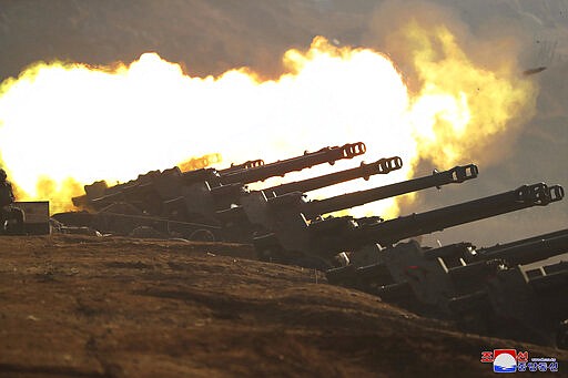 In this Friday, March 20, 2020, photo provided by the North Korean government, an artillery firing competition between army units is held in the country's west in North Korea. Independent journalists were not given access to cover the event depicted in this image distributed by the North Korean government. The content of this image is as provided and cannot be independently verified. Korean language watermark on image as provided by source reads: &quot;KCNA&quot; which is the abbreviation for Korean Central News Agency. (Korean Central News Agency/Korea News Service via AP)