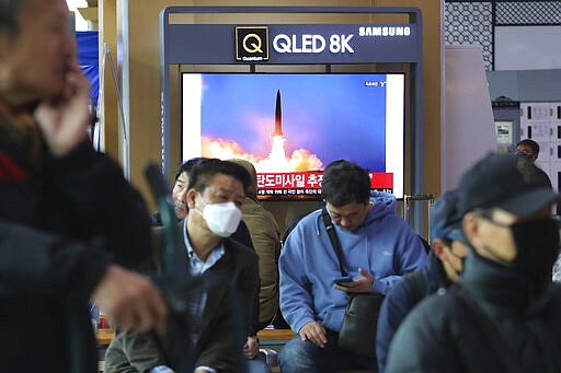 A television screen shows a file image of North Korea's missile launch during a news program at the Seoul Railway Station in Seoul, South Korea, Saturday, March 21, 2020. North Korea on Saturday fired two presumed short-range ballistic missiles into the sea, South Korea's military said, as it continues to expand military capabilities amid deadlocked nuclear negotiations with the Trump administration and a crippling global health crisis. (AP Photo/Ahn Young-joon)