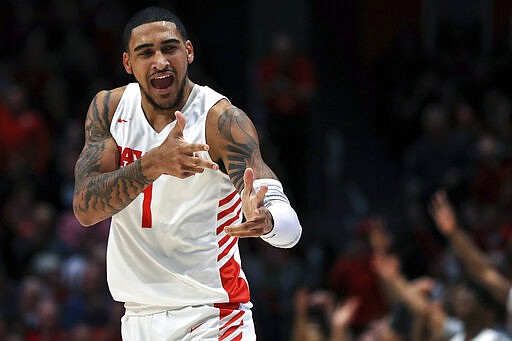 FILE - In this Feb. 11, 2020, file photo, Dayton's Obi Toppin (1) reacts in the first half in an NCAA college basketball game against Rhode Island in Dayton, Ohio. Toppin was selected to The Associated Press All-America first team, Friday, March 20, 2020. (AP Photo/Aaron Doster, File)