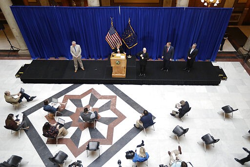 Indiana Secretary of State Connie Lawson speaks during a news conference at the Statehouse, Friday, March 20, 2020, in Indianapolis. Gov, Eric Holcomb said during the news conference with the state GOP and Democratic chairmen that the Indiana primary will instead be held on June 2 because of concern about the coronavirus pandemic. (AP Photo/Darron Cummings)