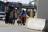 Virus prompts US and Mexico to restrict border travel