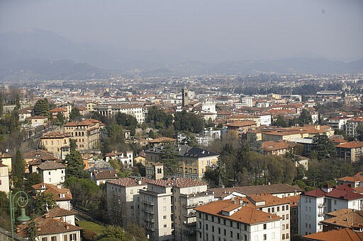 In this photo taken on Tuesday, March 17, 2020, a view of Bergamo, the heart of the hardest-hit province in Italy&#146;s hardest-hit region of Lombardy, Italy. For most people, the new coronavirus causes only mild or moderate symptoms. For some it can cause more severe illness, especially in older adults and people with existing health problems. (AP Photo/Luca Bruno)