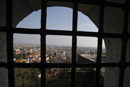 In this photo taken on Tuesday, March 17, 2020, a view of Bergamo, the heart of the hardest-hit province in Italy&#146;s hardest-hit region of Lombardy, Italy, Tuesday, March 17, 2020. For most people, the new coronavirus causes only mild or moderate symptoms. For some it can cause more severe illness, especially in older adults and people with existing health problems. (AP Photo/Luca Bruno)