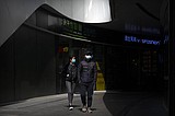 The Latest: Beijing screening overseas flights for virus