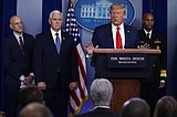 Trump angrily defends his handling of coronavirus pandemic