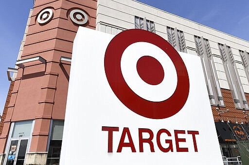 A view of the Target store in Annapolis, Md., Wednesday, March 18, 2020. Target is closing their stores at 9 p.m. daily to give employees time to replenish and deep clean the stores for shopper amid the coronavirus outbreak. Target also announced it will limit the first hour of shopping each Wednesday to the elderly and people with underlying health conditions. (AP Photo/Susan Walsh)