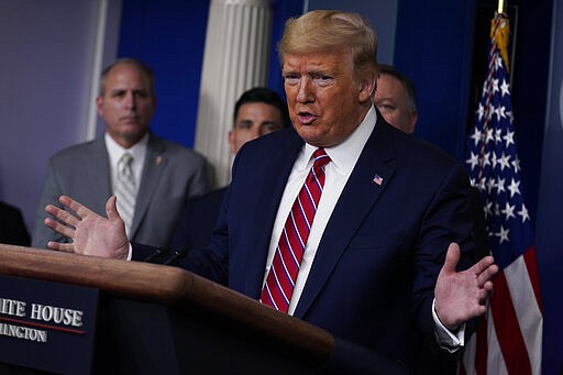 President Donald Trump speaks during a coronavirus task force briefing at the White House, Friday, March 20, 2020, in Washington. (AP Photo/Evan Vucci)