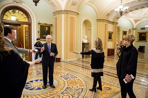 Senate Majority Leader Mitch McConnell of Ky. speaks to reporters outside the Senate chamber after Democrats blocked a coronavirus aid package on Capitol Hill, Monday, March 23, 2020, in Washington. (AP Photo/Andrew Harnik)