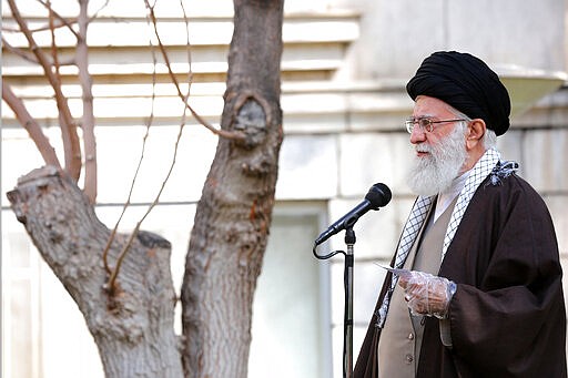 In this photo released by the office of the Iranian supreme leader, Supreme Leader Ayatollah Ali Khamenei speaks during a tree planting ceremony in Tehran, Iran, Tuesday, March 3, 2020. Iran's supreme leader put the Islamic Republic on war footing Tuesday against the new coronavirus by ordering its armed forces to assist health officials in combating the outbreak &#151; the deadliest outside of China &#151; that authorities say has killed 77 people. (Office of the Iranian Supreme Leader via AP)