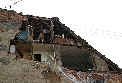 A collapsed wall leaves an exposed home after an earthquake in Zagreb, Croatia, Sunday, March 22, 2020. A strong earthquake shook Croatia and its capital on Sunday, causing widespread damage and panic. (AP Photo/Darko Bandic)