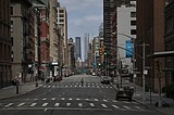 New York quiets to slow virus as pressure grows on Olympics