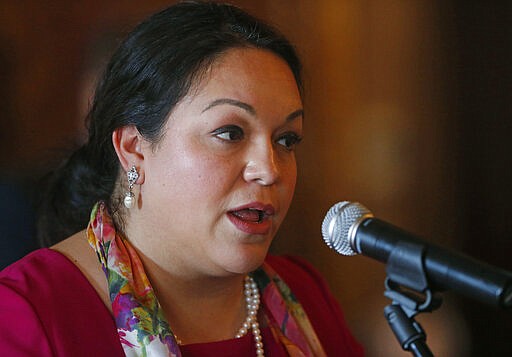 In this Feb. 6, 2018, file photo, Democratic Sen. Luz Escamilla speaks during a news conference at the Utah State Capitol, in Salt Lake City. Escamilla was diagnosed with COVID-19 on Friday, March 20, 2020.  She has experienced symptoms and is quarantined along with her family, she said late Sunday, March 22. (AP Photo/Rick Bowmer, File )