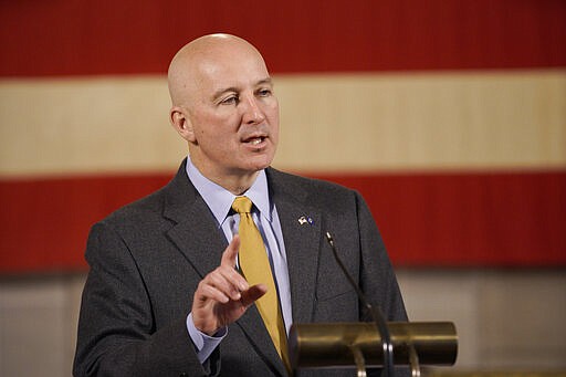 Nebraska Gov. Pete Ricketts speaks during a news conference in Lincoln, Neb., Monday, March 23, 2020, where he provided updates on Nebraska's response to the coronavirus outbreak. (AP Photo/Nati Harnik)