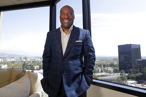 FILE - In this Sept. 5, 2019 file photo, comedian and media mogul Byron Allen poses for a picture Thursday, Sept. 5, 2019, in Los Angeles. The Supreme Court has thrown out a lower court ruling in favor of a black media mogul and comedian who&#146;s suing cable giant Comcast for racial discrimination. The justices agreed unanimously Monday that an appeals court applied the wrong legal standard in allowing business owner Byron Allen&#146;s $20 billion lawsuit against Comcast to go forward.(AP Photo/Chris Carlson)