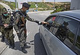 War-torn Syria braces for lockdown after first virus case