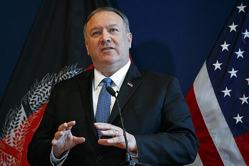 FILE - In this June 25, 2019, file photo, U.S. Secretary of State Mike Pompeo speaks during a news conference at the U.S. Embassy Kabul during an unannounced visit to Afghanistan. On Monday, March 23, 2020, Pompeo arrived in Kabul on an urgent visit to try to move forward a U.S. peace deal signed last month with the Taliban. Pompeo's trip to the Afghan capital comes despite the coronavirus pandemic, at a time when world leaders and statesmen are curtailing official travel. (AP Photo/Jacquelyn Martin, Pool)