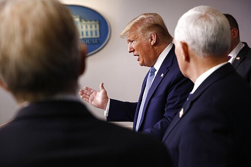 FILE - In this Saturday, March 21, 2020, file photo President Donald Trump speaks during a coronavirus task force briefing at the White House in Washington. Trump seems intent on being the public face of the effort against what has become the most serious challenge for a president in a reelection year. (AP Photo/Patrick Semansky, File)