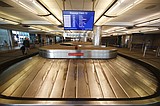 Many airline flights nearly empty as virus undercuts travel