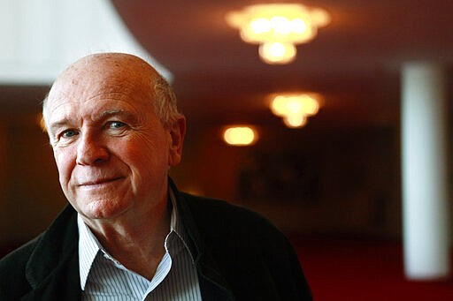 FILE - In this April 1, 1010, file photo, playwright Terrence McNally poses at the Kennedy Center in Washington. McNally, one of America&#146;s great playwrights whose prolific career included winning Tony Awards for the plays &quot;Love! Valour! Compassion!&quot; and &quot;Master Class&quot; and the musicals &quot;Ragtime&quot; and &quot;Kiss of the Spider Woman,&quot; died Tuesday, March 24, 2020, of complications from the coronavirus. He was 81. (AP Photo/Jacquelyn Martin, File)