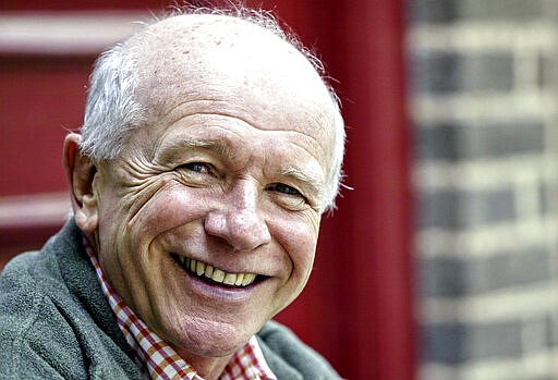 FILE - This May 14, 2006 file photo shows Tony Award winning playwright Terrence McNally in front of the Philadelphia Theater Company  in Philadelphia. McNally, one of America&#146;s great playwrights whose prolific career included winning Tony Awards for the plays &quot;Love! Valour! Compassion!&quot; and &quot;Master Class&quot; and the musicals &quot;Ragtime&quot; and &quot;Kiss of the Spider Woman,&quot; died Tuesday, March 24, 2020, of complications from the coronavirus. He was 81. (AP Photo/H. Rumph Jr)